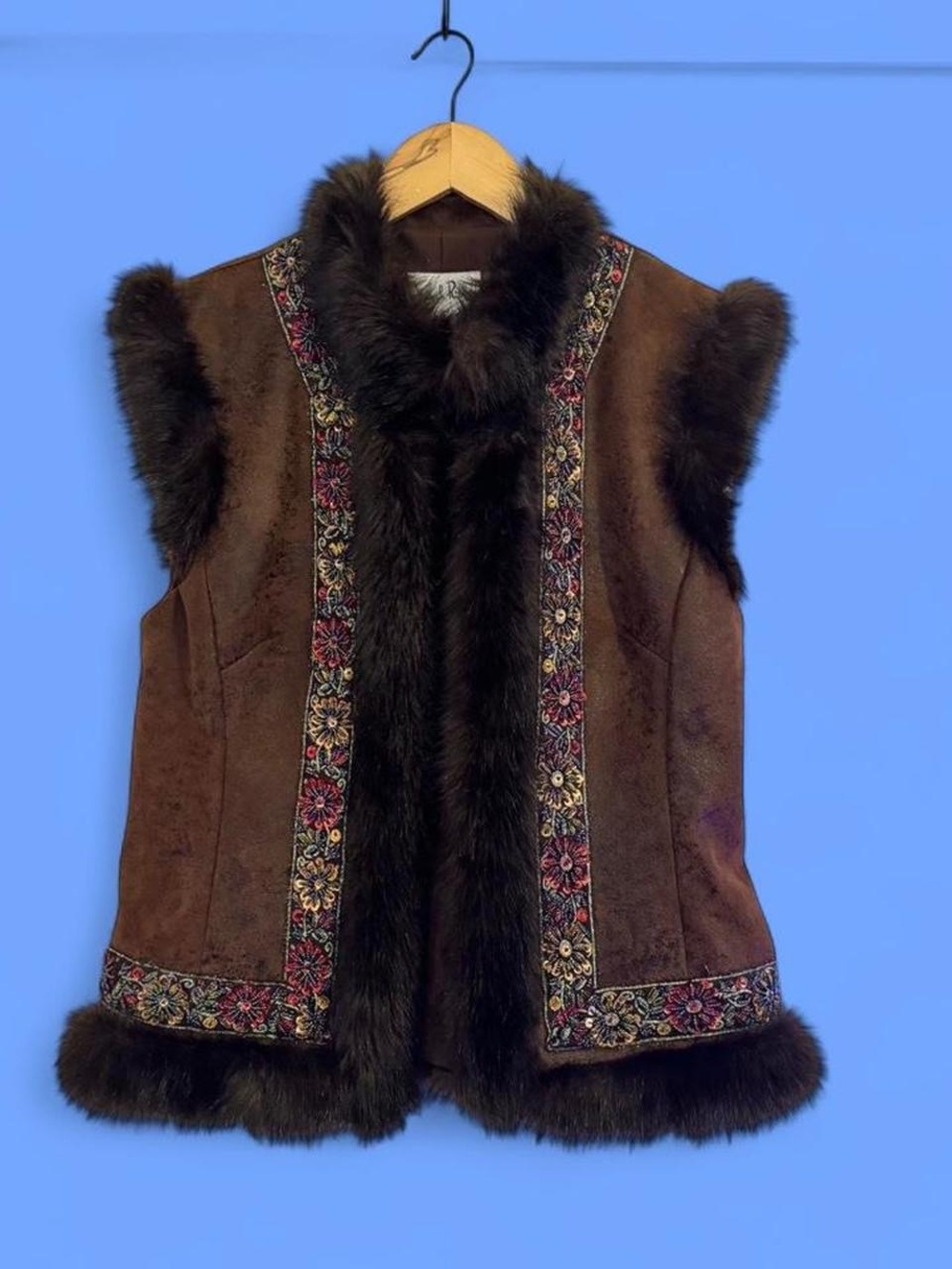 Vintage beaded fur lined vest